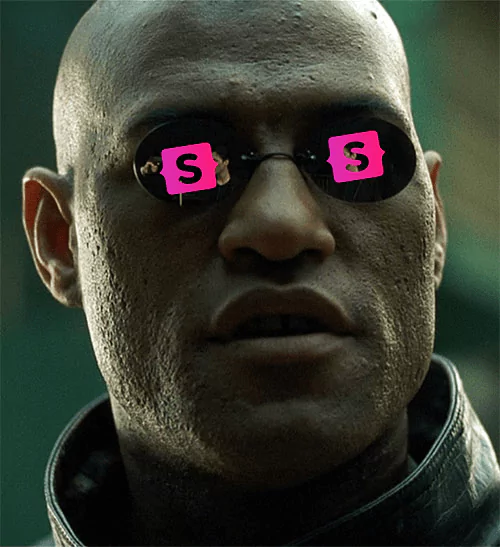 Laurence Fishburne (Matrix) wearing small sunglasses with the pink Statamic logo over each of the lenses.